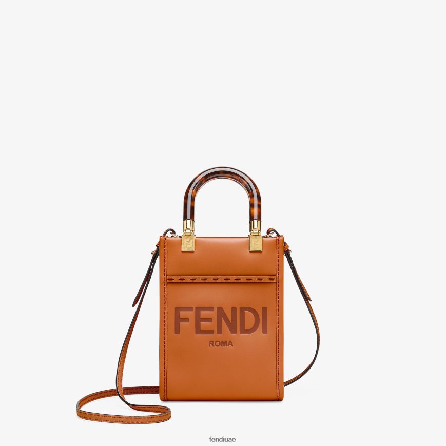 حقيبة صن شاين شوبر صغيرة من الجلد بني Fendi نحيف مُكَمِّلات TNL80L681